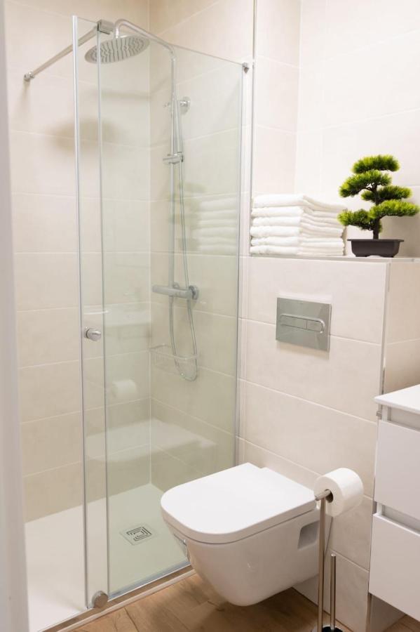 Lujoso Apartamento Entre 2 Playas Con Garaje, Wifi กิฮอน ภายนอก รูปภาพ